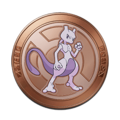 Medalla Mewtwo Bronce UNITE.png